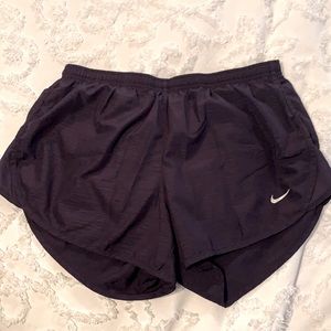 Purple Nike shorts